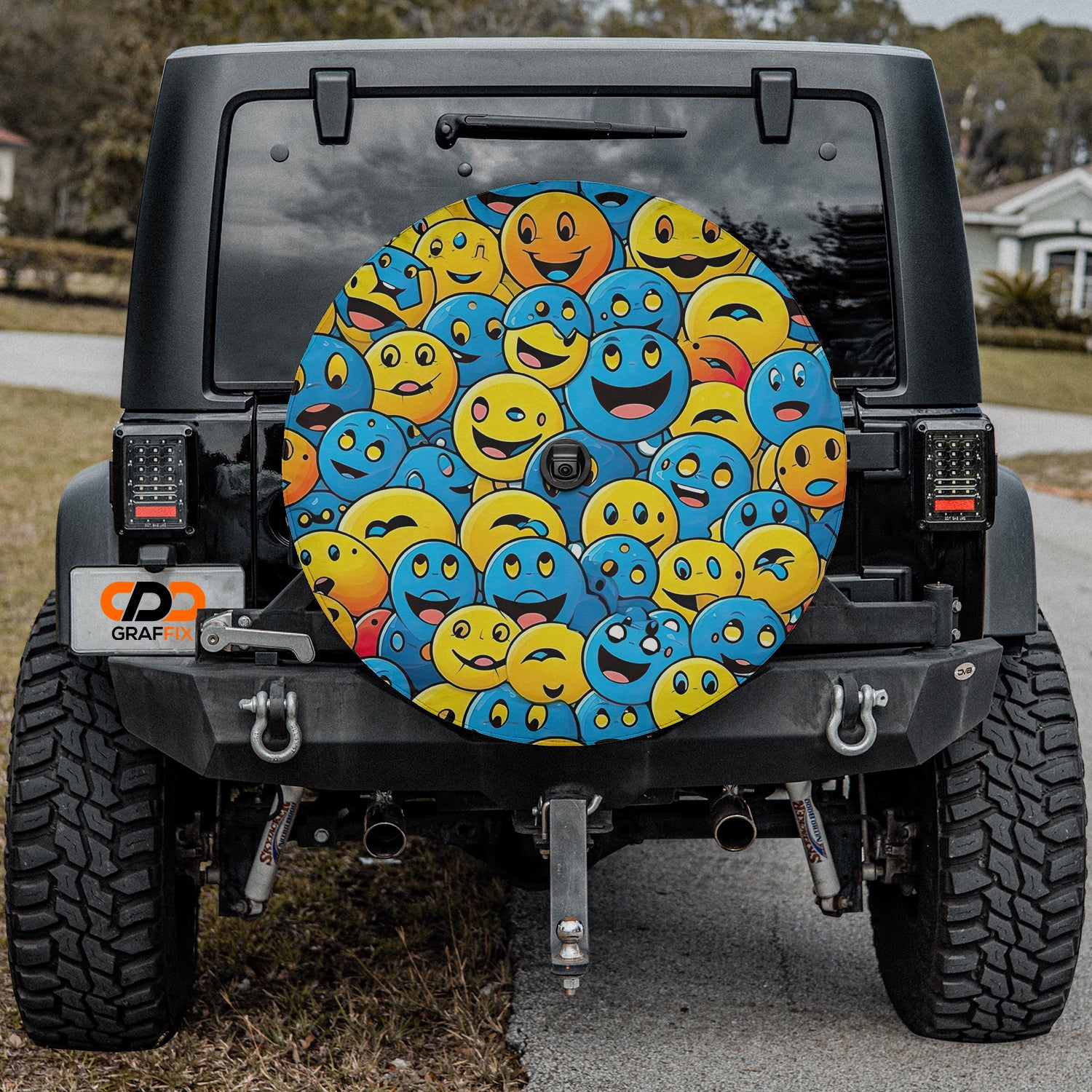 a jeep with smiley faces painted on it