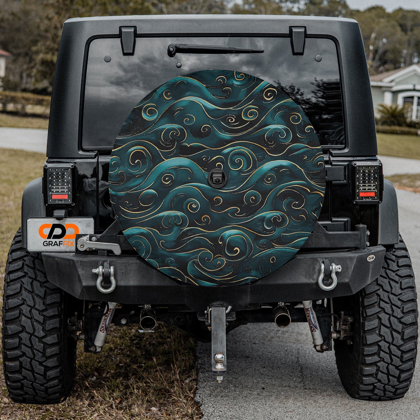 a black jeep with a blue and green design on it