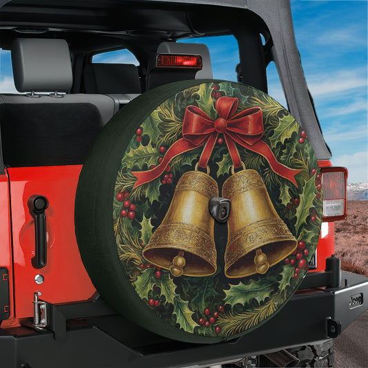 a tire cover with a christmas wreath and two bells