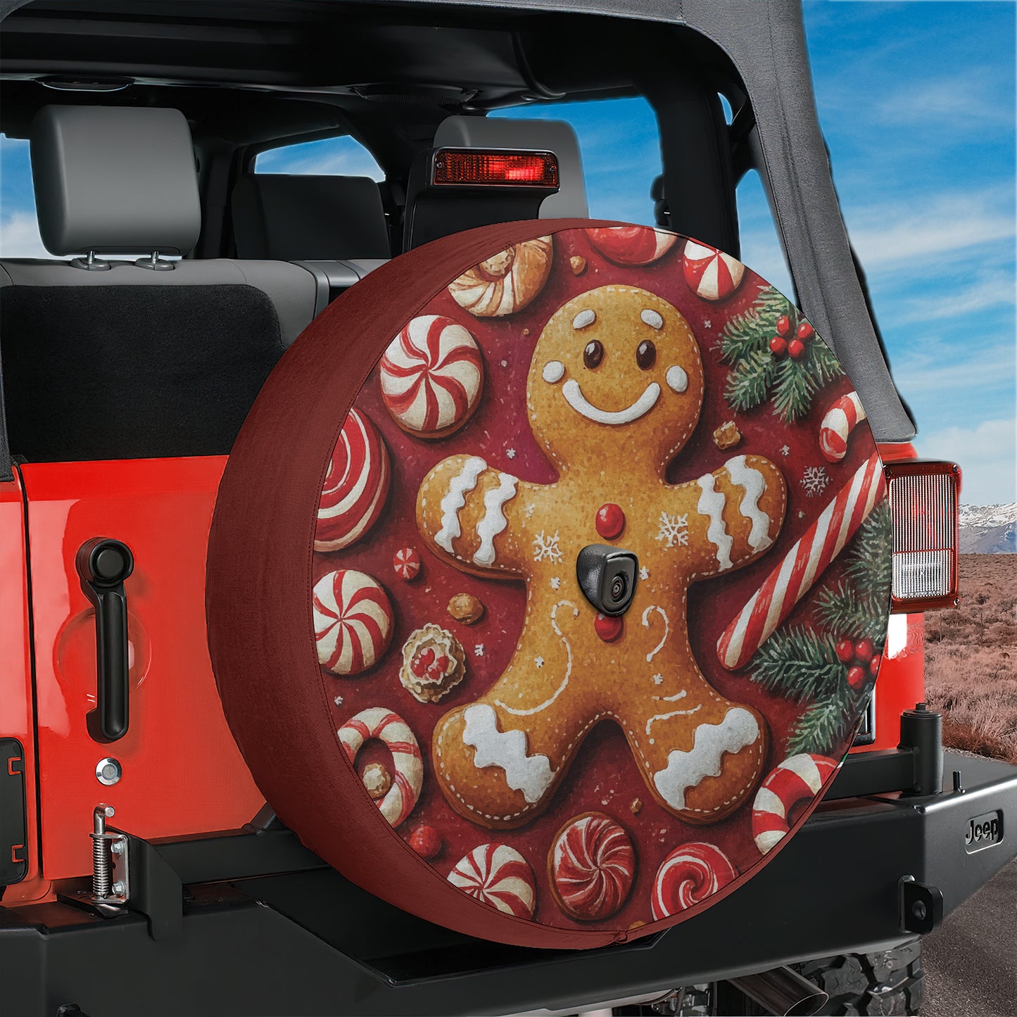 a decorated tire cover with a gingerbread man on it