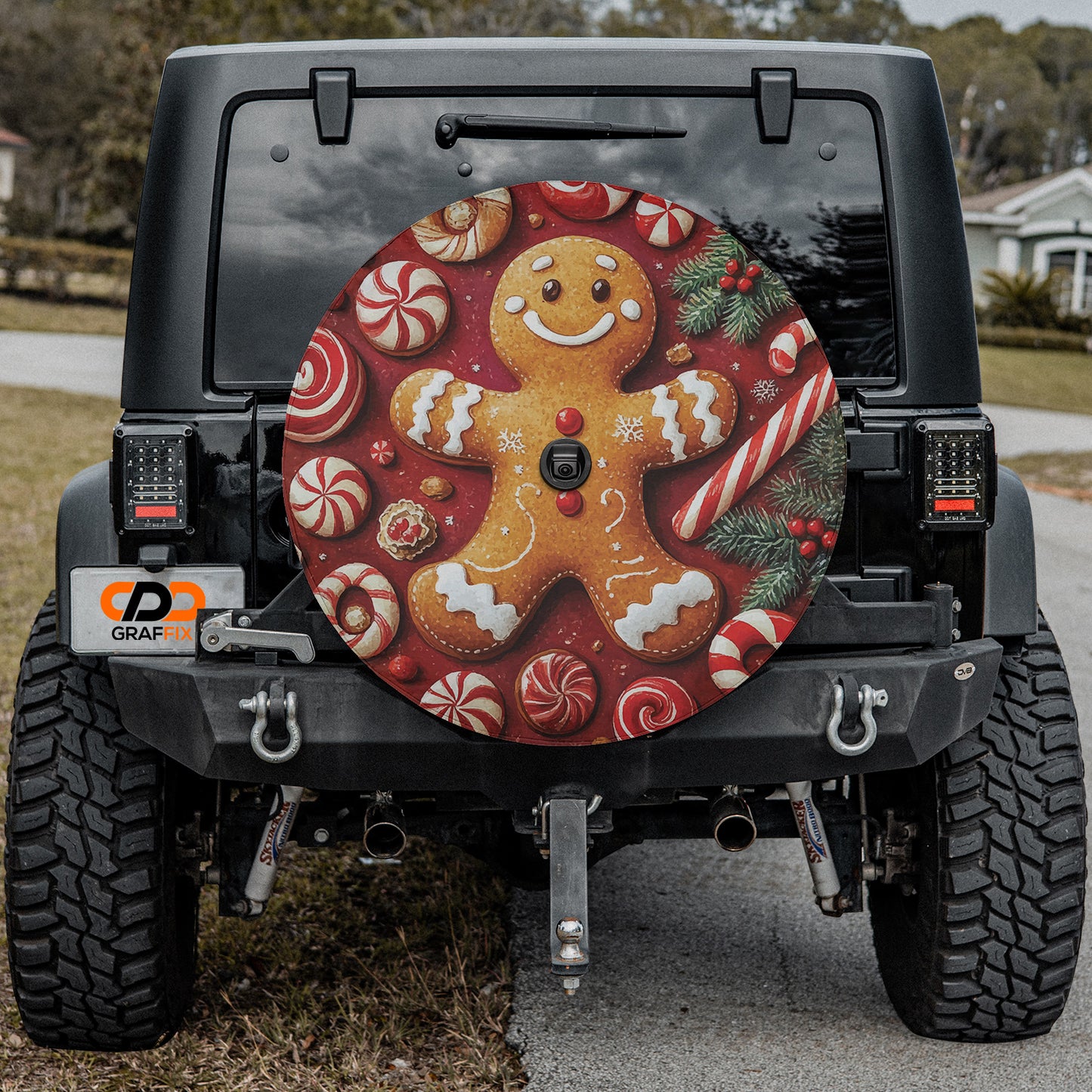 a decorated jeep with a gingerbread man on the front